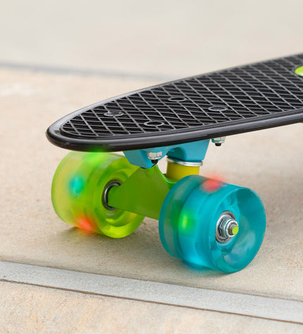 Set of four EVO skateboards with colorful decks, suitable for outdoor sport and toy play, perfect for kids and teens.