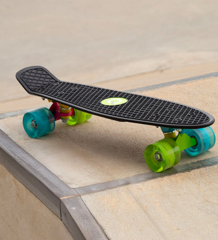 Four EVO skateboard toys, colorful plastic skateboards for kids, suitable for outdoor play and sport activities.