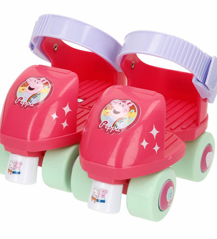 Pair of Peppa Pig skates for kids, featuring colorful design and adjustable straps, perfect for outdoor play and fun.