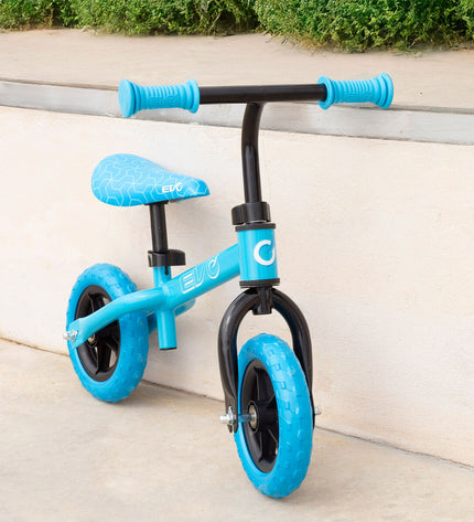 Children's EVO Kinderfiets EVO toy bike with training wheels, colorful frame, and handlebar grips for outdoor play and fun.