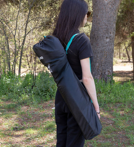 Pair of Aktive foldable camping chairs in black with metal frames, compact size, suitable for outdoor activities and hiking.