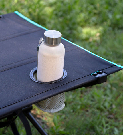 Two Aktive folding tables, 63x42x56 cm, lightweight and portable, ideal for camping and outdoor activities.