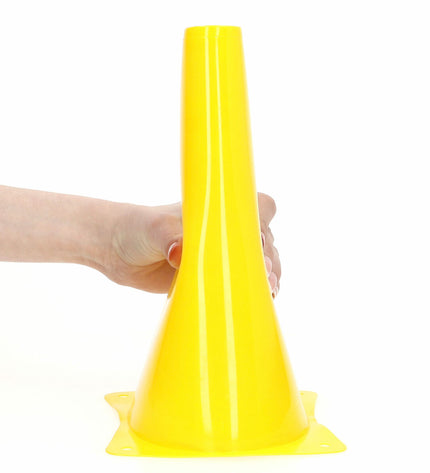 Set of six Aktive Kegels for sport and outdoor football training, featuring colorful, durable training cones on a grassy field.