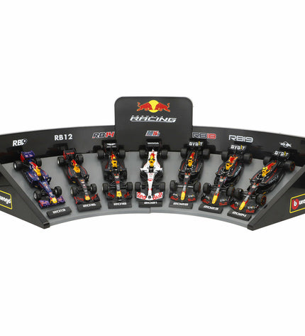 Set of four Red Bull Raceauto BURAGO toy cars in red, featuring detailed vehicle designs for play and collection.