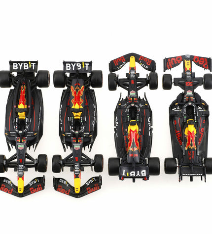 Set of four Red Bull Raceauto toy vehicles by Burago, detailed miniature racing cars for play and collection.