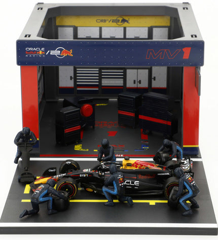 Four Red Bull Raceauto Burago toy vehicles in red, designed for play and collection, featuring detailed vehicle models.
