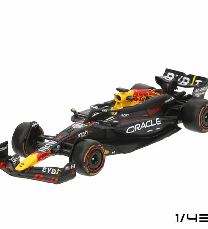 Four Red Bull BURAGO toy vehicles, detailed miniature race cars from the Raceauto Red Bull collection, on a plain background.