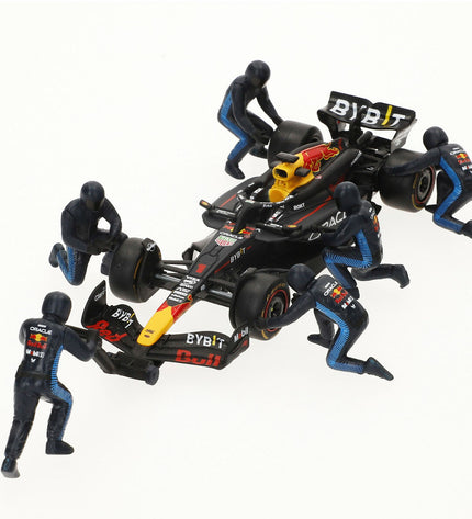 Four Red Bull Raceauto BURAGO toy vehicles featuring red and black design, detailed miniature race cars for play and collection.