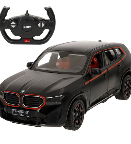 Two BMW remote control police cars toy vehicles in black and white with police markings, designed for children to play with.
