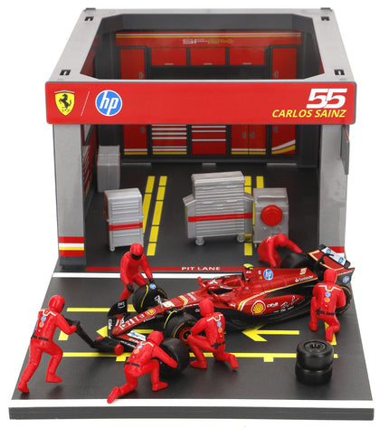 Four Ferrari toy trucks, detailed miniature vehicles for play and collection, showcasing red and black truck designs.