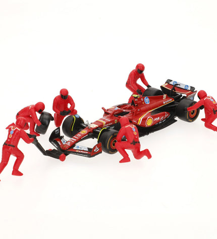 Set of four Ferrari toy trucks, detailed miniature vehicles for play and collection, featuring bright red color and realistic design.