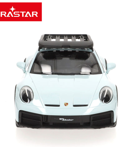 Two Porsche remote control police cars, measuring 32x12x13 cm, in blue with police markings, suitable for children’s play.