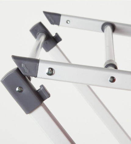 Two Max Home metal laundry lines, 75x104x37 cm, ideal for home storage and organization, shown hanging in a laundry room.