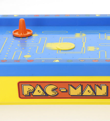 Two Pac-Man domino game pieces featuring classic Pac-Man characters, perfect for toy and game enthusiasts.