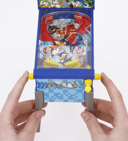Set of four Sonic the Hedgehog pinball toys, colorful arcade-style game pieces from Sonic brand for fun gaming accessories.