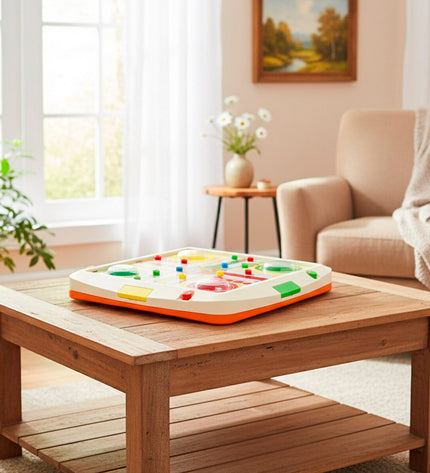 Colorbaby Mens-Erger-Je-Niet game set with four colorful plastic pieces for family fun and classic gameplay.