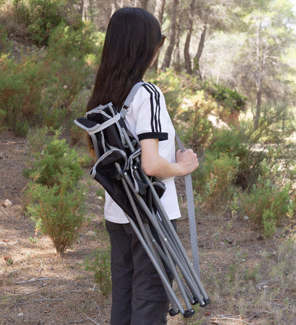 Set of four black Aktive foldable camping chairs, lightweight and compact, ideal for outdoor activities and outdoor seating.