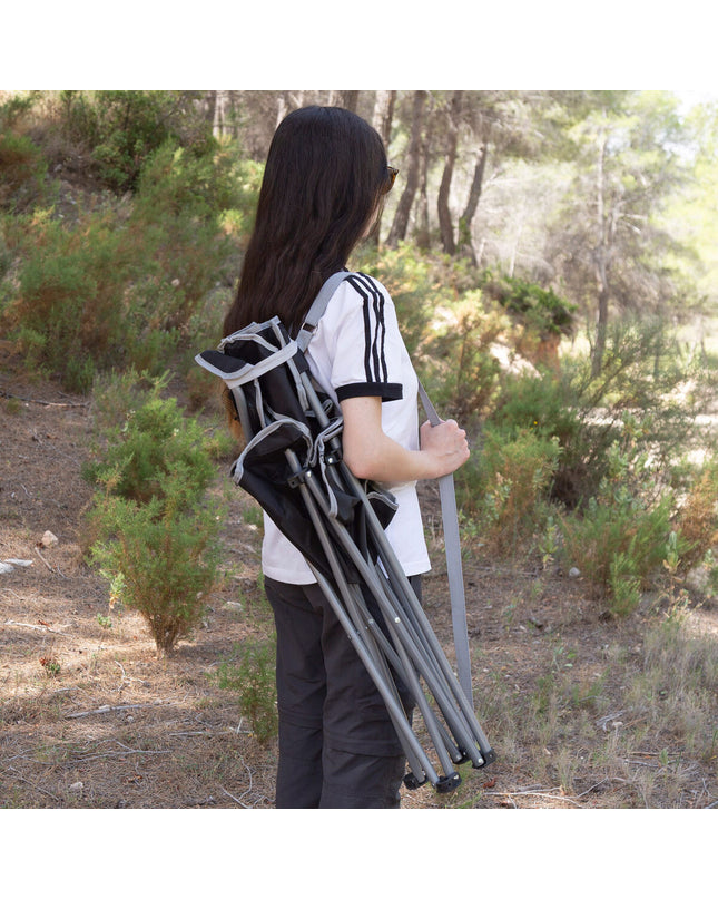 Set of four black Aktive foldable camping chairs, lightweight and compact, ideal for outdoor activities and outdoor seating.