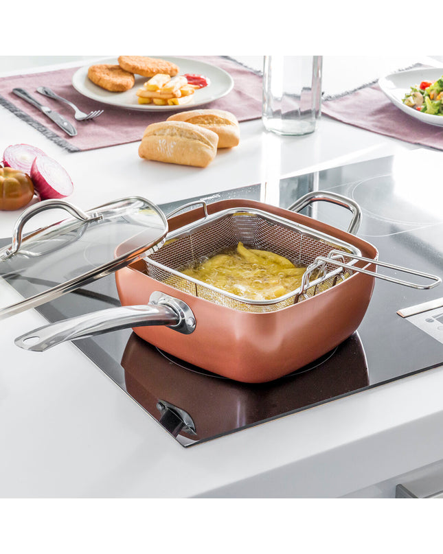 Copper 5 in 1 multifunctional ceramic cookware set by InnovaGoods with four interlocking kitchen pots and pans.