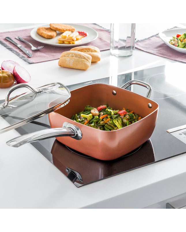 InnovaGoods Copper 5-in-1 ceramic cookware set with four kitchen utensils, showcasing the versatile kitchen tools and pans.