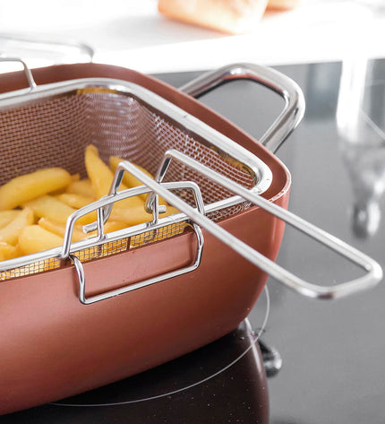 InnovaGoods Copper 5-in-1 multifunctional ceramic cookware set with four pieces, suitable for home cooking and kitchen use.