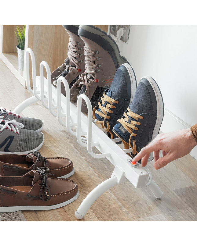 InnovaGoods electric shoe rack with 80W power, holding four pairs of shoes, designed for home storage and organization.