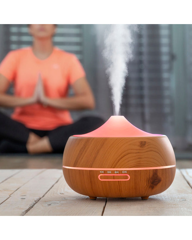 InnovaGoods Aromaverstuiver bevochtiger with colorful LED lights, wooden-effect housing, portable air conditioning for home and kitchen use.