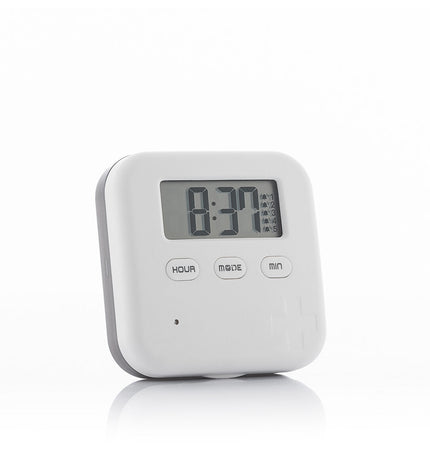 InnovaGoods electronic intelligent pill organizer for home and bathroom use, with compartments and digital display.