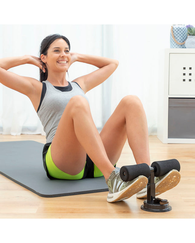 InnovaGoods CoreUp abdominal grip with suction cup and exercise guide for core workouts, shown with handle and grip in use.
