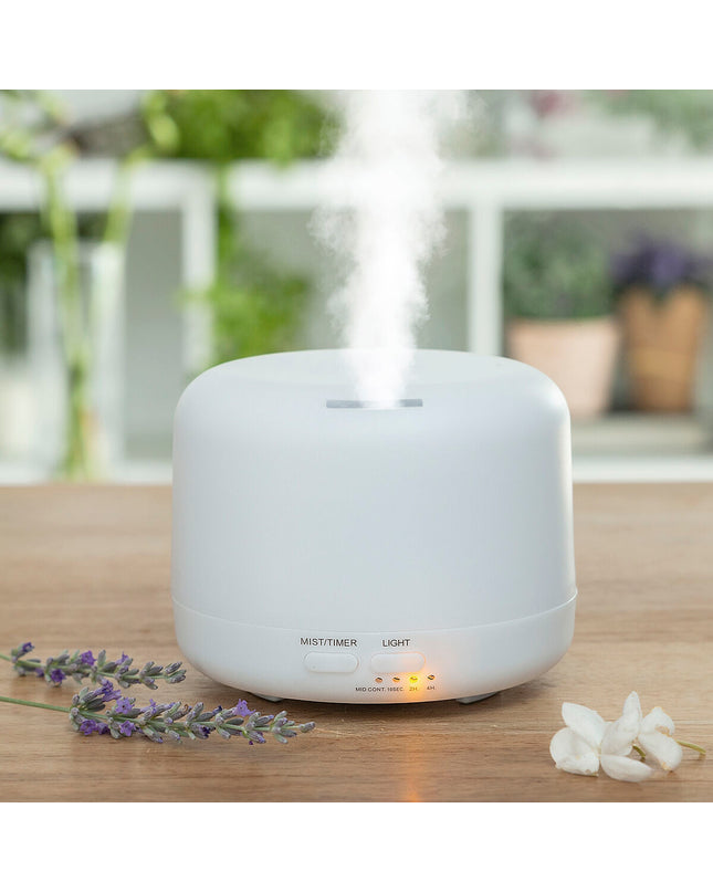 InnovaGoods Aromaverstuiver bevochtiger with multi-colored LED lights, portable air conditioning device for home and kitchen use.
