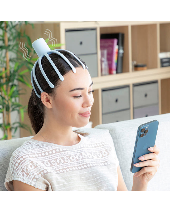 InnovaGoods Helax rechargeable massager with removable head, designed for health and personal care, placed on a white background.