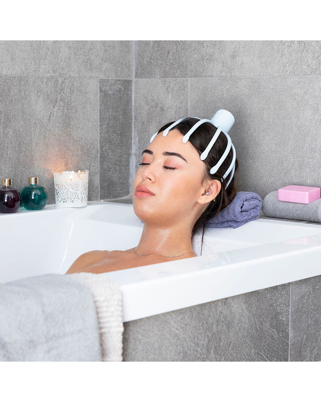 InnovaGoods Helax rechargeable massager with a removable head for personal wellness and relaxation.