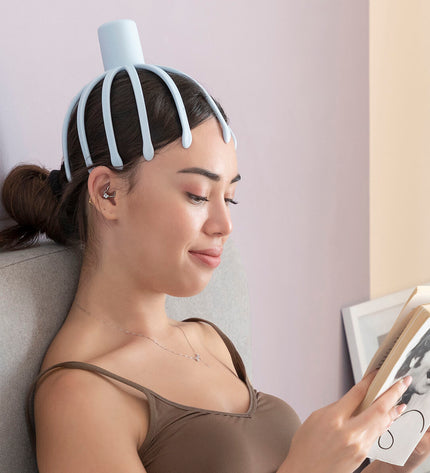 InnovaGoods Helax massager with rechargeable head for personal wellness and health, shown in use or close-up.