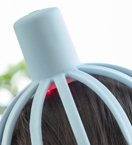 InnovaGoods Helax rechargeable massager with removable head, designed for personal wellness and relaxation.