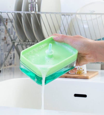 InnovaGoods 2-in-1 kitchen soap dispenser on countertop, modern design for home cleaning and kitchen use.