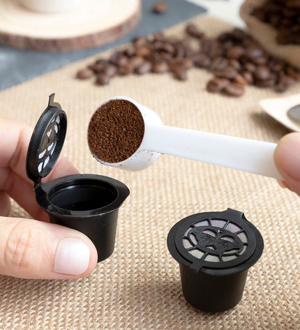 Set of 3 reusable coffee capsules from InnovaGoods for eco-friendly brewing in kitchen and coffee setup.