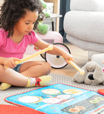 InnovaGoods 2-in-1 muziekmat for kids with colorful buttons and musical features, designed for interactive play and learning.