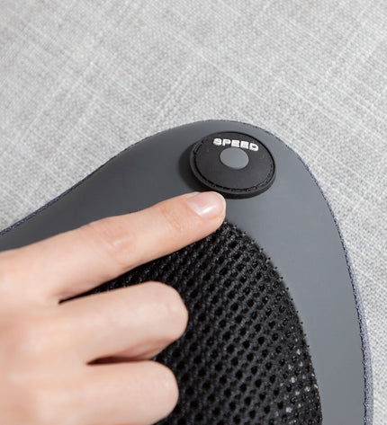 InnovaGoods Compact Shiatsu-massager for health and wellness, showing its ergonomic design and control buttons.
