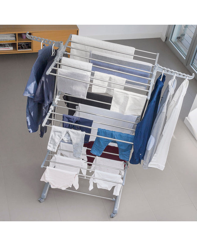 InnovaGoods collapsible vertical clothes drying rack on wheels with 24 rods, ideal for laundry storage and organization.