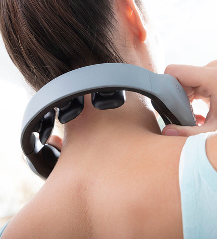 InnovaGoods rechargeable neck massager with remote control, designed for health and personal wellness, shown on a person's neck.