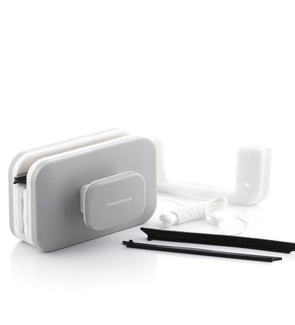 InnovaGoods Magnetische Ramenreiniger Klinduo for kitchen cleaning, showing the sleek magnetic cleaning tool with a handle.