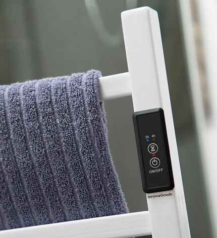 InnovaGoods electric wall or floor towel rail in a modern bathroom setting with sleek design and chrome finish.