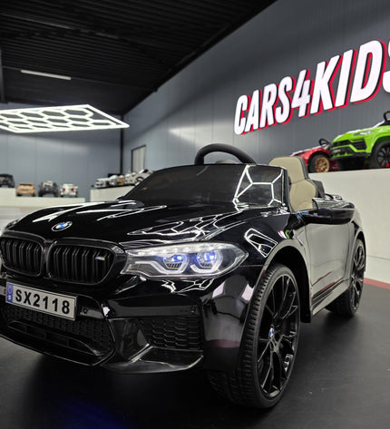 BMW M5 24 volt metallic zwarte kinderauto