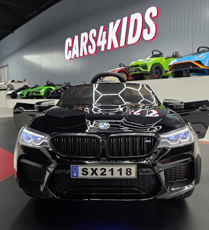 BMW M5 24 volt metallic zwarte kinderauto