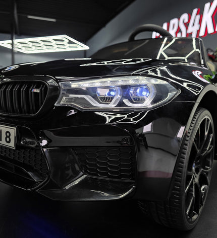 BMW M5 24 volt metallic zwarte kinderauto