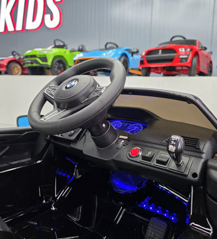 BMW M5 24 volt metallic zwarte kinderauto
