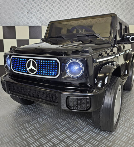 Kinderauto Mercedes EQG zwart 12 volt