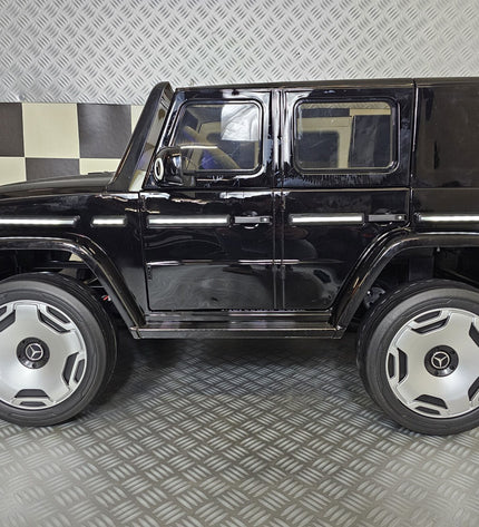 Kinderauto Mercedes EQG zwart 12 volt