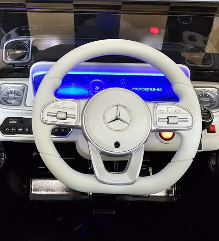 Kinderauto Mercedes EQG zwart 12 volt
