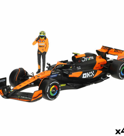 Set of four McLaren F1 2024 toy cars, miniature vehicle models for play and collection, with detailed McLaren branding.